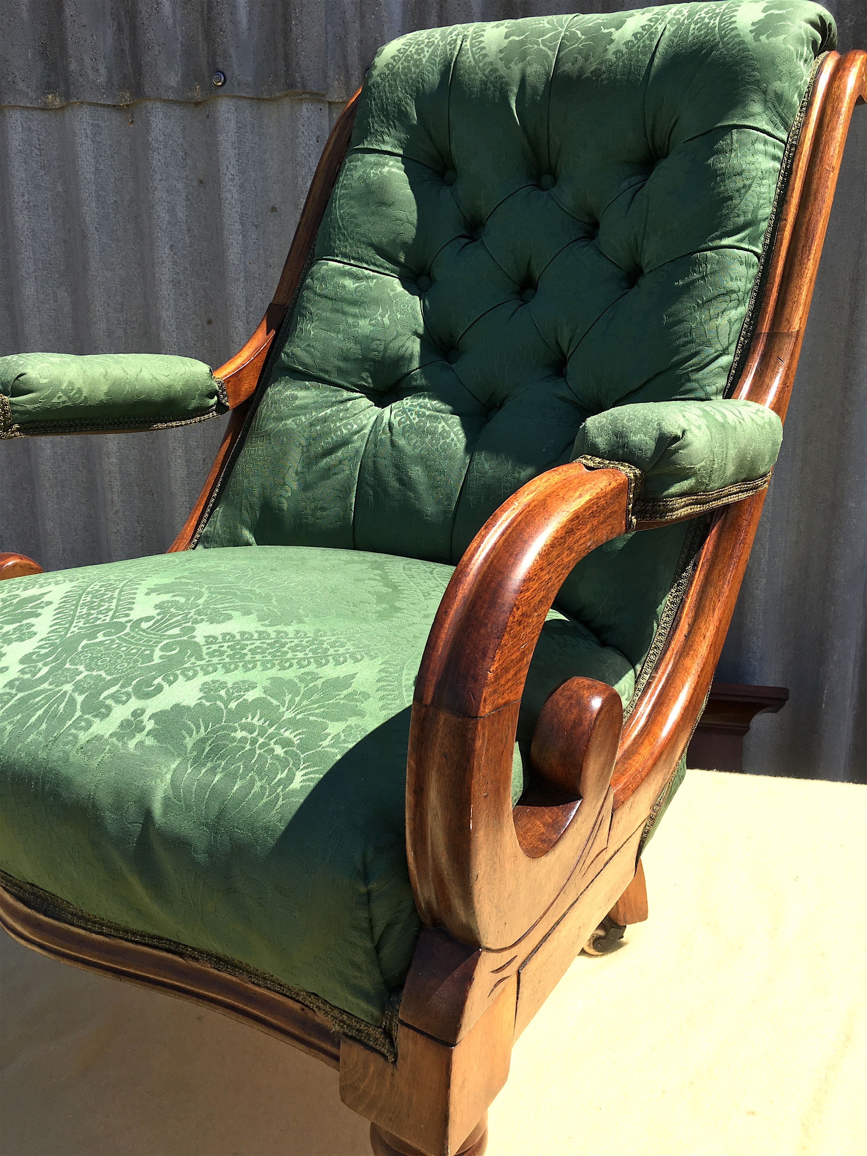 A mid Victorian upholstered mahogany armchair, width 66cm, depth 70cm, height 94cm